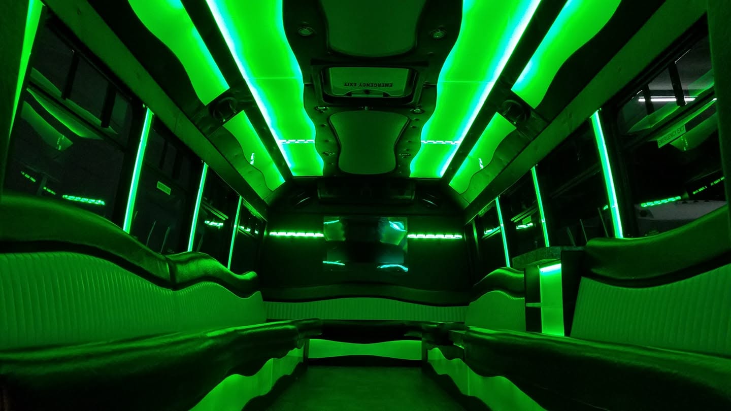 Green-lit cabin down the center aisle