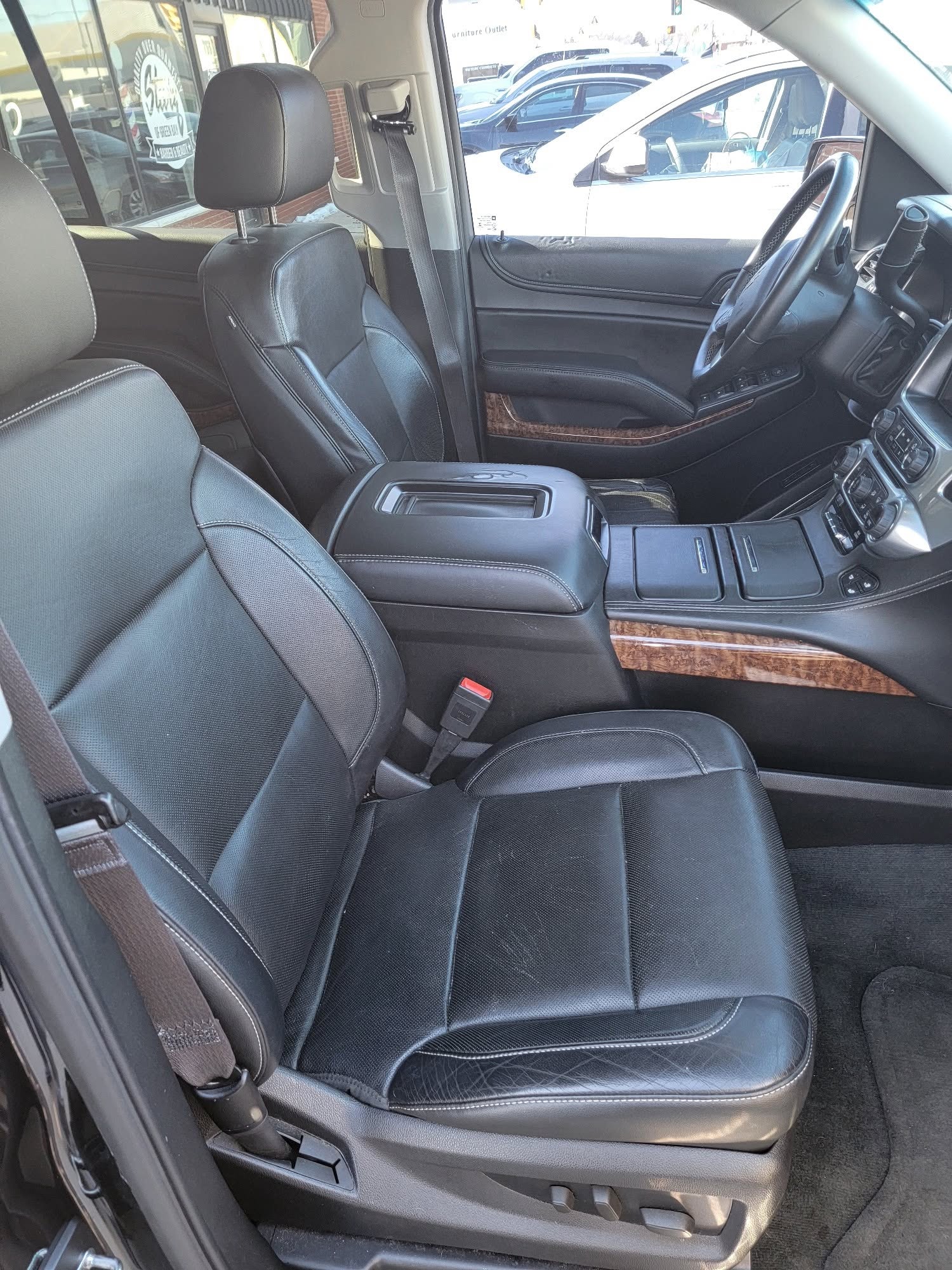 Front leather seats and dashboard of the Tahoe.